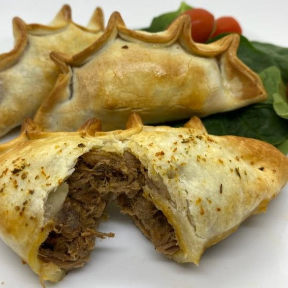 Beef Flank and provoleta empanadas parbaked